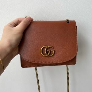 Gucci double G brooch on Madewell leather bag